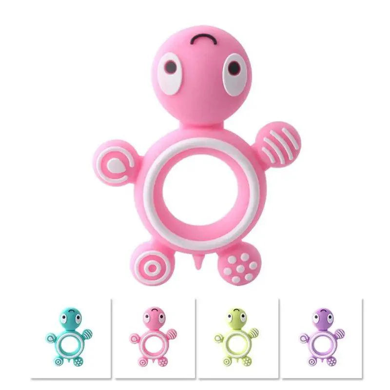 Turtle-shaped food-grade silicone teether for baby gum relief in pink, blue, green, and purple.