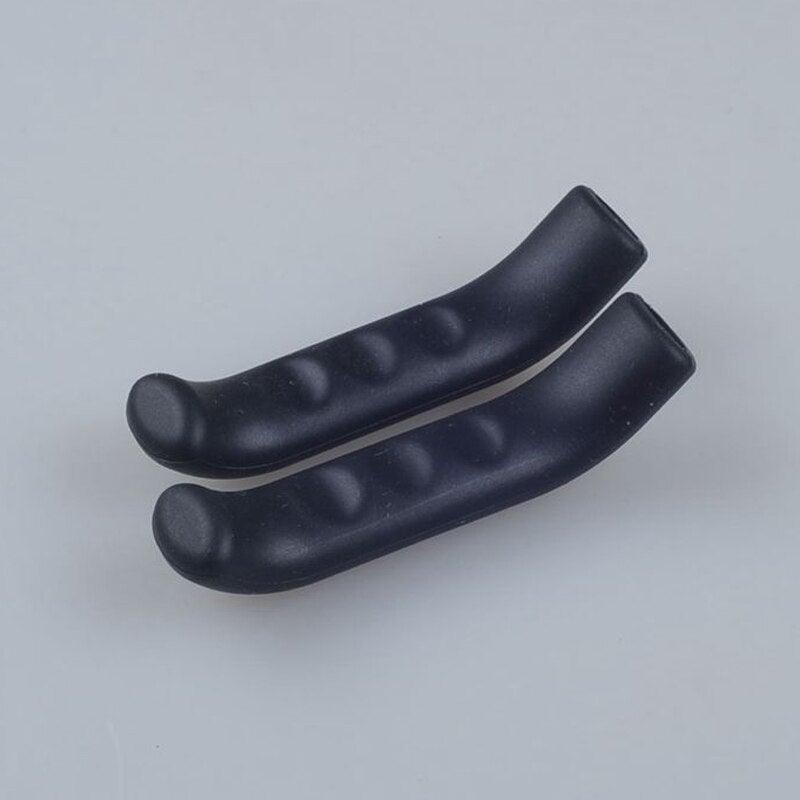 Close-up of anti-slip silicone bike brake lever grips on a bicycle handlebar