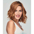 Simmer Elite by Raquel Welch featuring a 100% hand-tied base and heat-friendly synthetic hair.