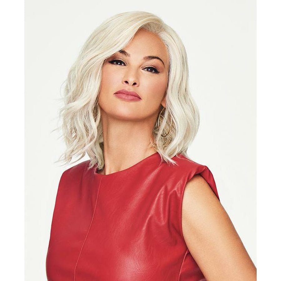 A stylish mid-length lob Simmer wig in a modern platinum shade.