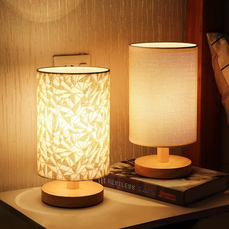 Modern minimalist table lamp with a solid wood base and soft dimmable light.