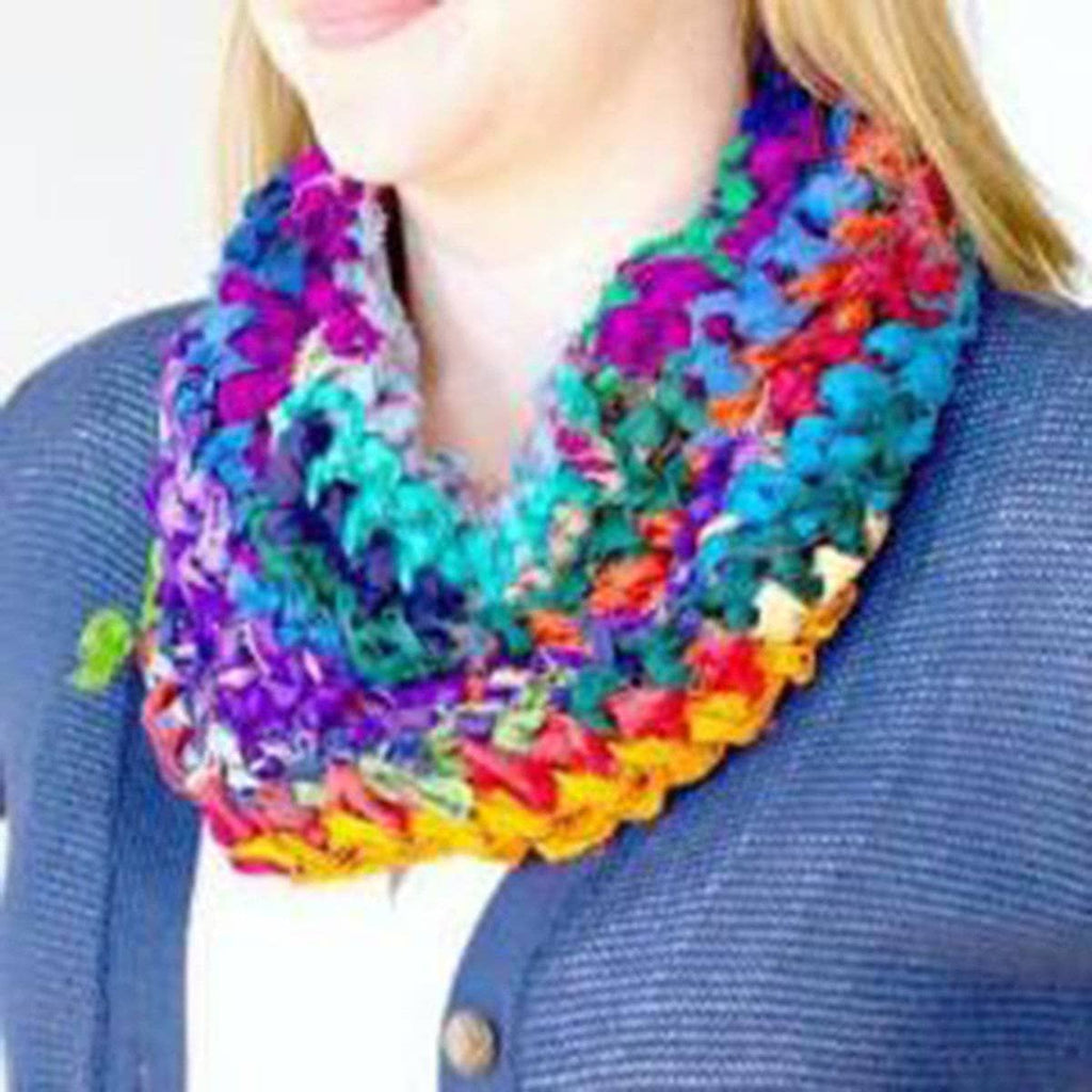 Simple Sari Cowl crochet pattern infinity scarf in a vibrant multi-color rainbow spectrum.
