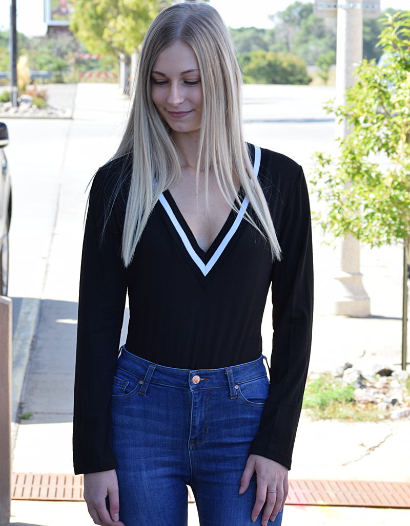 Close-up view of the Simply Chic V-Neck Bodysuit in a flattering, versatile silhouette.