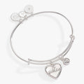 Silver expandable bangle featuring a heart-shaped Mother of Pearl charm with 'Sister' text and a crystal accent.