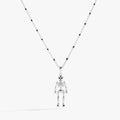 Modern skeleton pendant necklace with jet black beads on a silver chain.