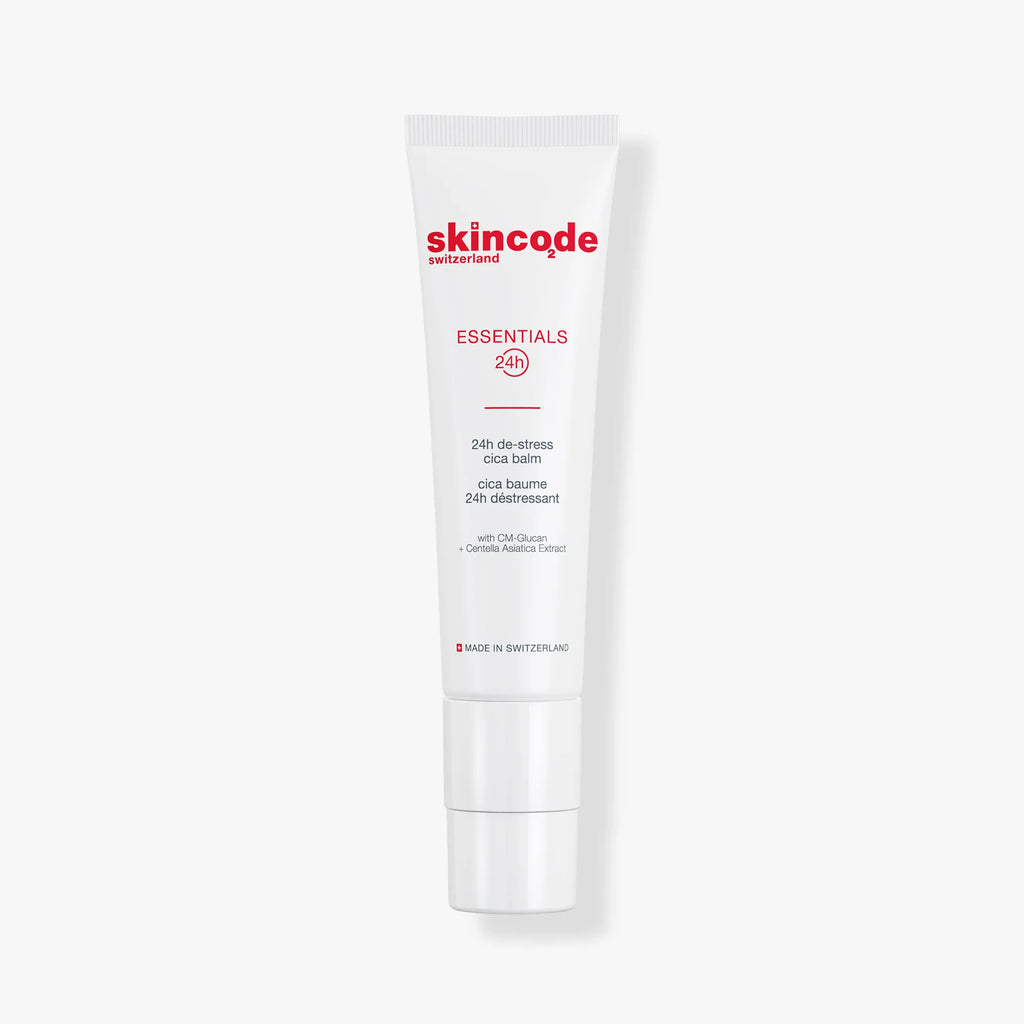 Skincode 24h De-Stress Cica Balm in white minimalist pump packaging with red text.