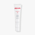 Skincode 24h De-Stress Cica Balm in white minimalist pump packaging with red text.
