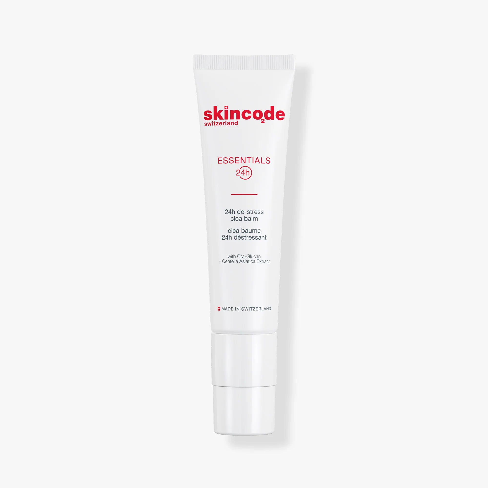 Skincode 24h De-Stress Cica Balm in white minimalist pump packaging with red text.