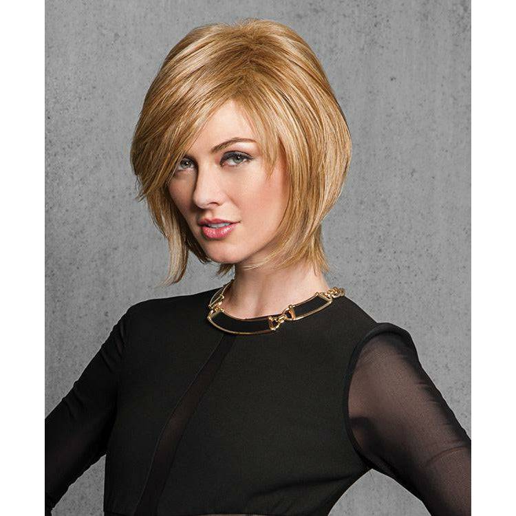Woman wearing a Sleek & Chic textured synthetic bob wig in blonde and brown