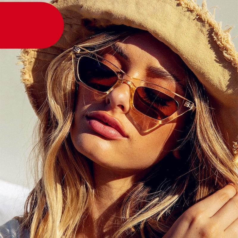 A pair of retro cat eye sunglasses with lightweight frames on a neutral background.