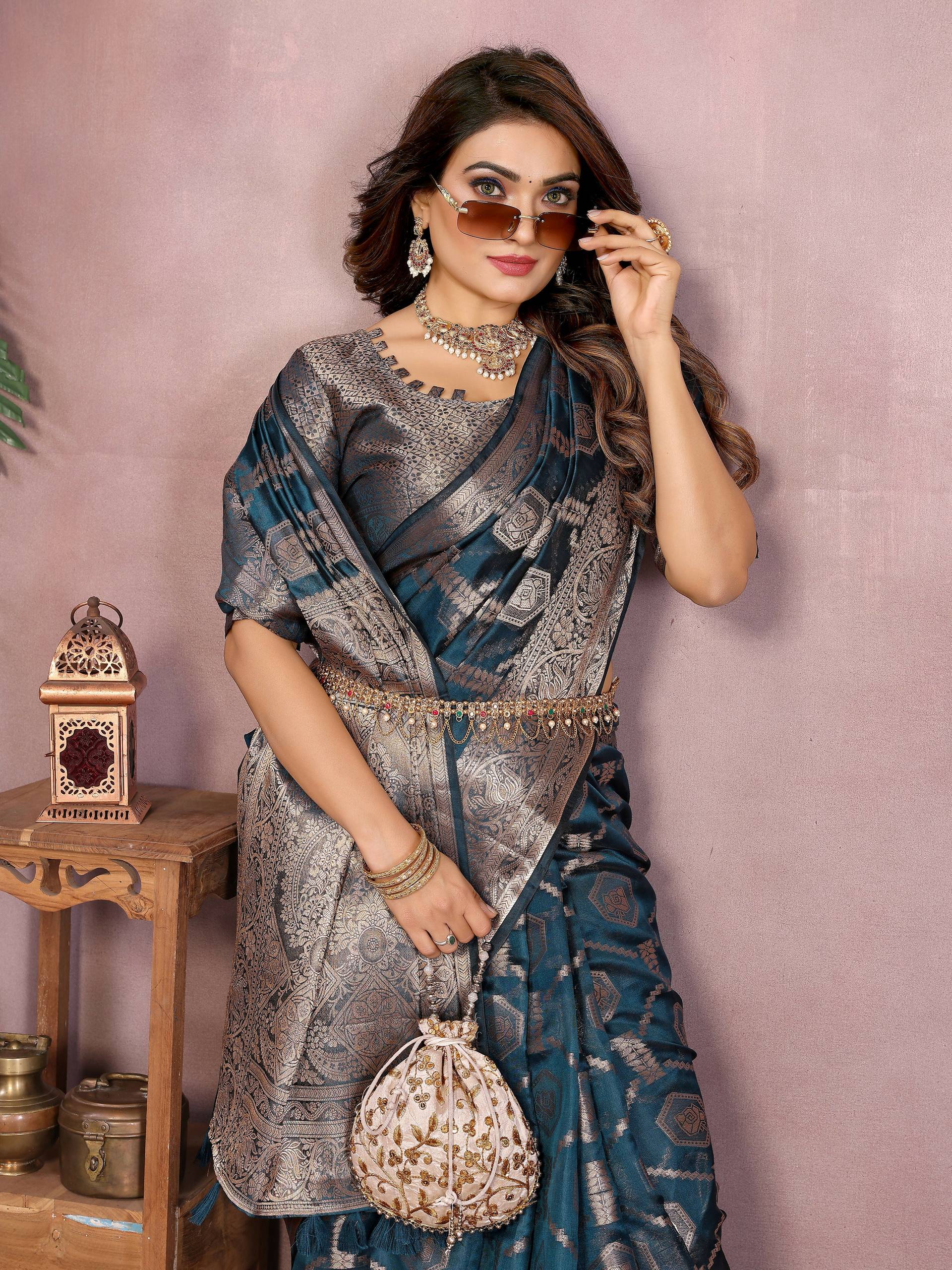 Teal Soft Organza Silk Saree with Intricate Weaving Detail