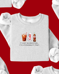 Unisex grey knit pullover featuring a Diet Coke graphic text design