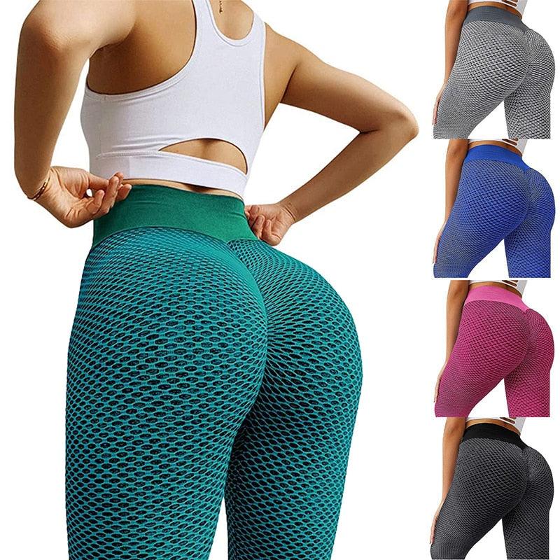 Woman wearing high-waisted peach lift-up leggings for gym and yoga workout
