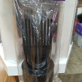 Solid black Soft 'N Style Vented Air Pik for hair styling shown from a side profile view.