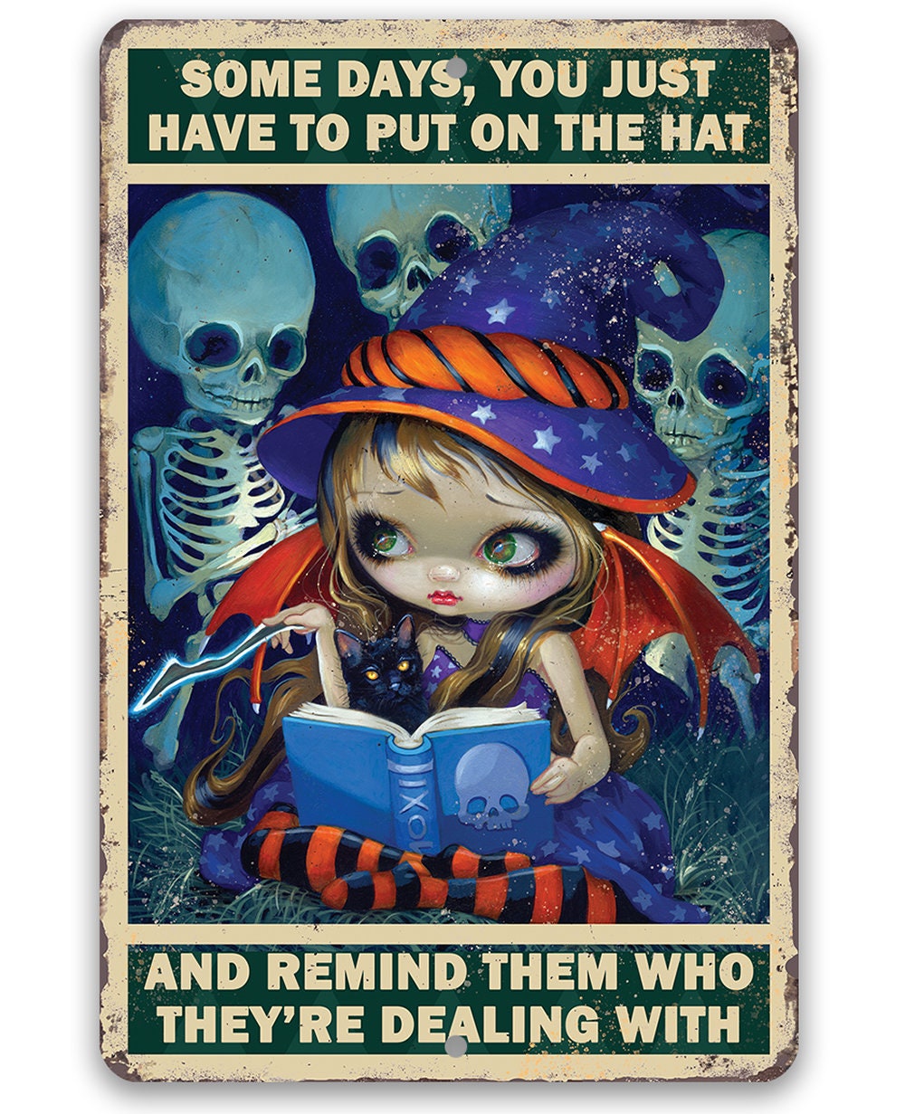 Decorative metal sign featuring a cartoon witch, skeletons, and the text Some Days, You Just Have to Put on the Hat