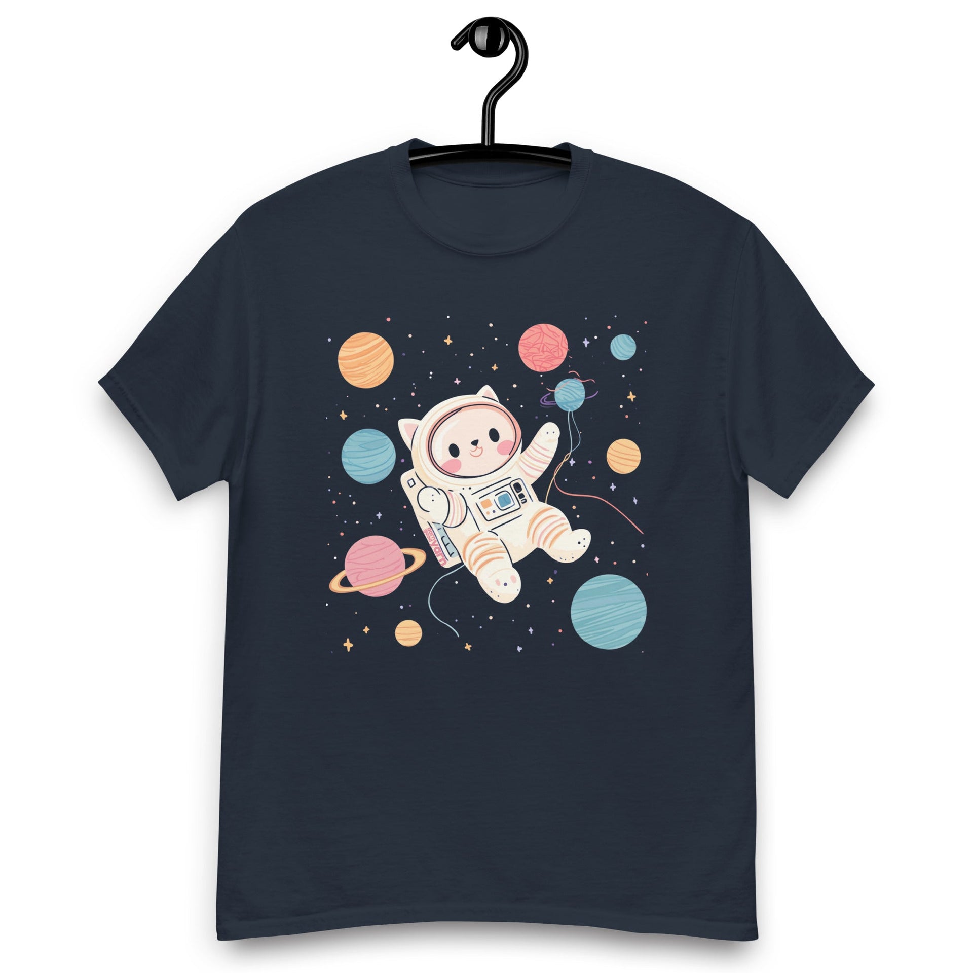 Astronaut cat chasing yarn planets on a soft graphic t-shirt