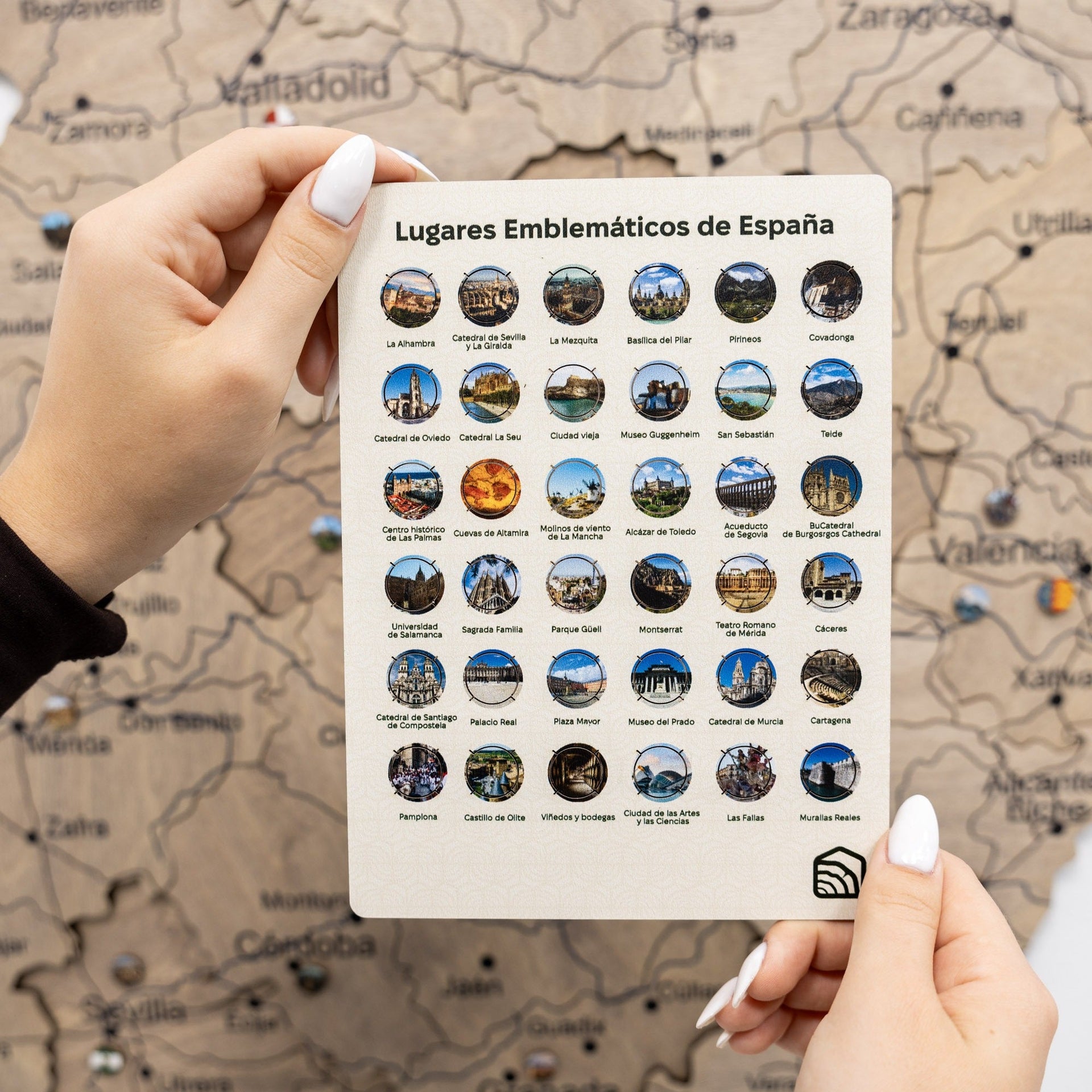 Set of decorative wooden pins featuring iconic Spanish landmarks
