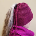 Burgundy boho spiral knit beanie with ponytail drawstring opening