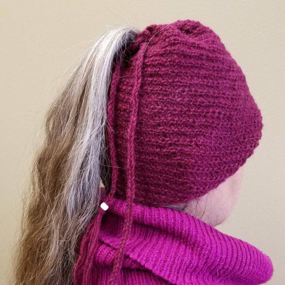 Burgundy boho spiral knit beanie with ponytail drawstring opening