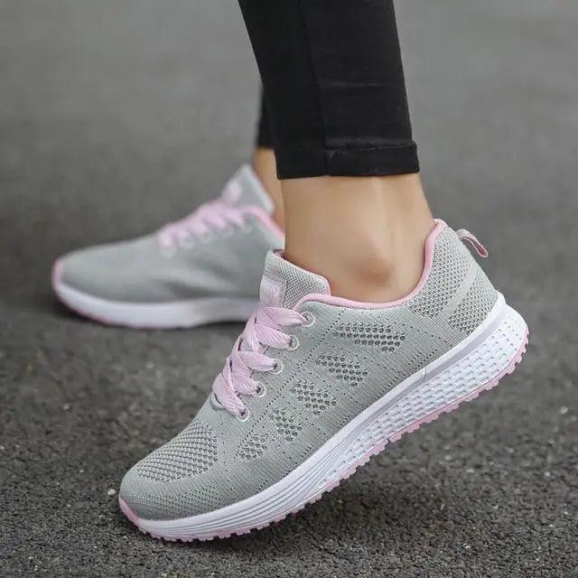 Modern lightweight women’s mesh sneakers in a casual, breathable athletic design