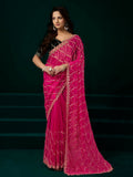 Rani pink net saree with elegant black velvet blouse