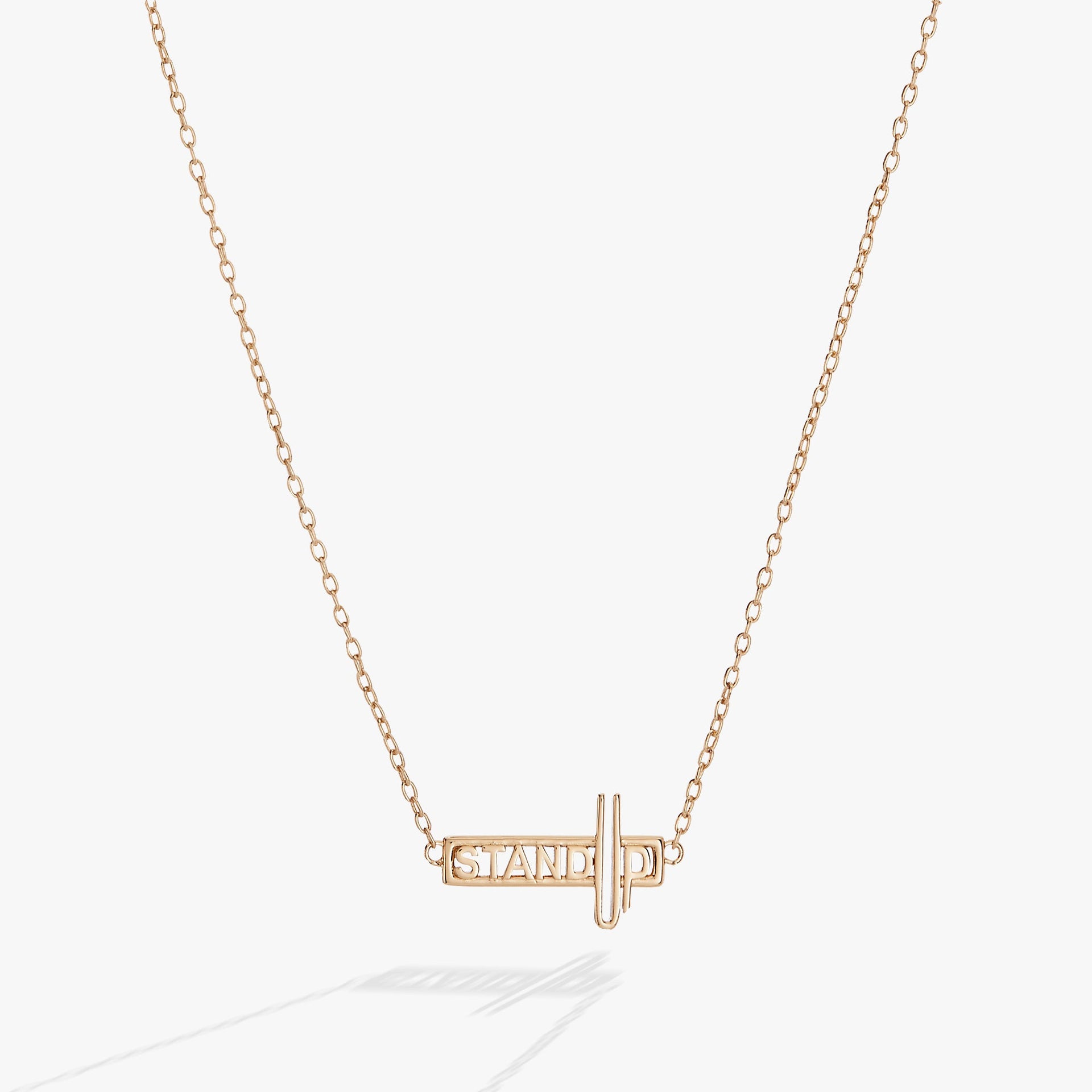 Alex And Ani Stand Up pendant necklace on a delicate gold chain.