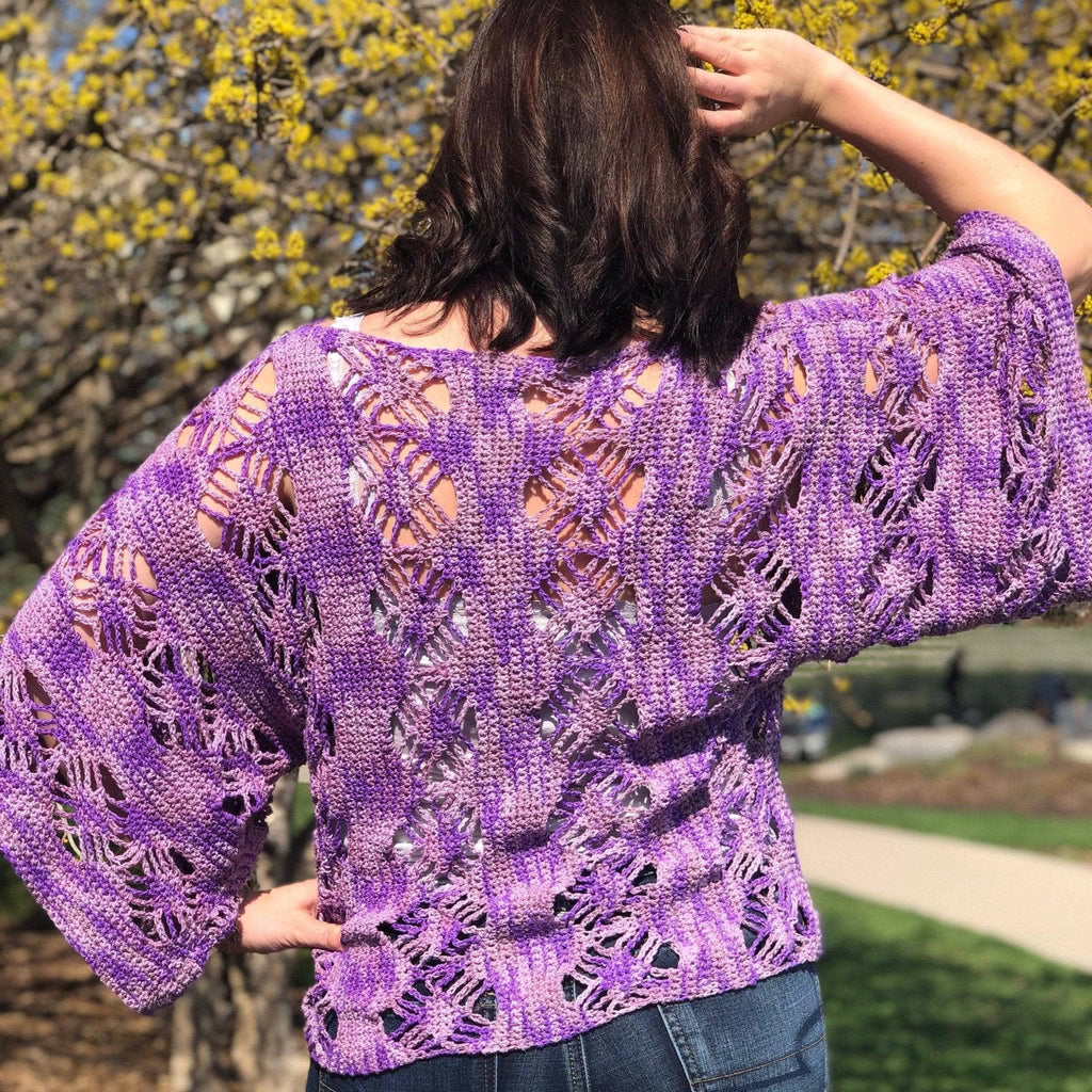 Purple and lavender web tee crochet top featuring geometric spider stitch design