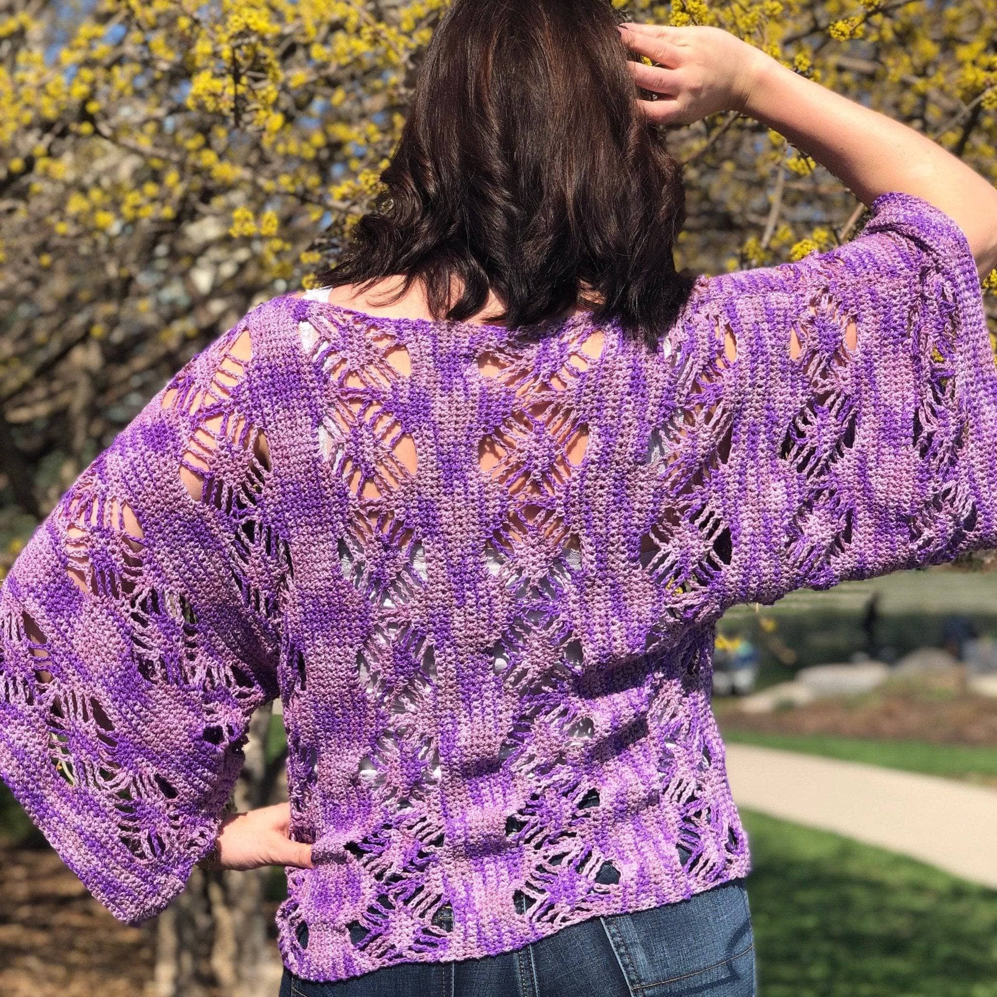Purple and lavender web tee crochet top featuring geometric spider stitch design
