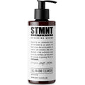 STMNT All-In-One Cleanser bottle in brown and white minimalist packaging.