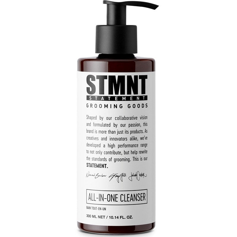 STMNT All-In-One Cleanser bottle in brown and white minimalist packaging.