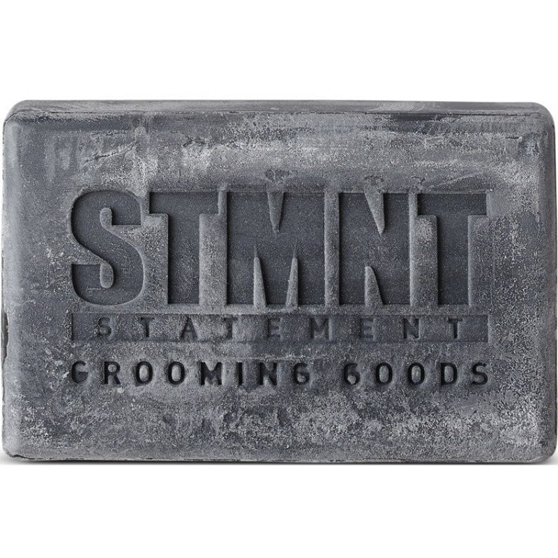 STMNT Hair & Body Cleansing Bar 4.4 oz in packaging, a multipurpose charcoal-based grooming bar.