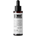 STMNT 1.6 oz beard oil bottle for grooming and softening facial hair