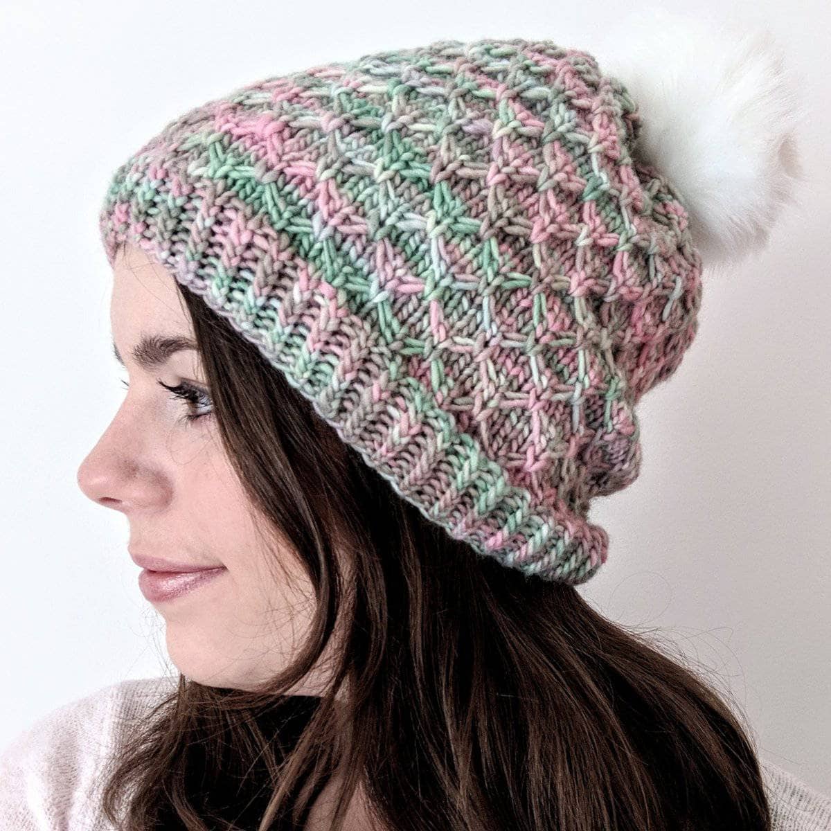 Storyteller Hat knitted from soft merino wool, shown as part of a DIY knitting kit.