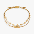 Two-piece Stranded bracelet set featuring heart charms and a cubic zirconia accented love plate.