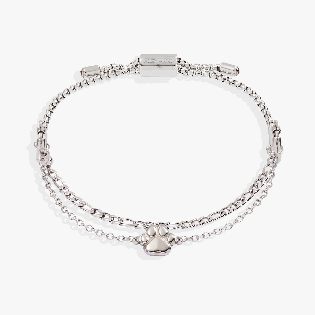 Pet-inspired bracelet set featuring a delicate paw print charm and an accent chain.