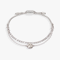 Pet-inspired bracelet set featuring a delicate paw print charm and an accent chain.
