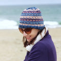 Stripe-A-Dots matching knit hat and fingerless gloves set displayed on a neutral background.