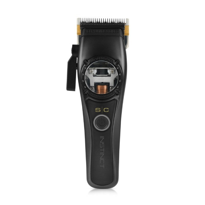 Stylecraft Instinct professional hair clipper in metallic finish with gold-tone accents