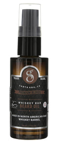 Amber bottle of Suavecito Beard Oil with metallic silver and black labeling.