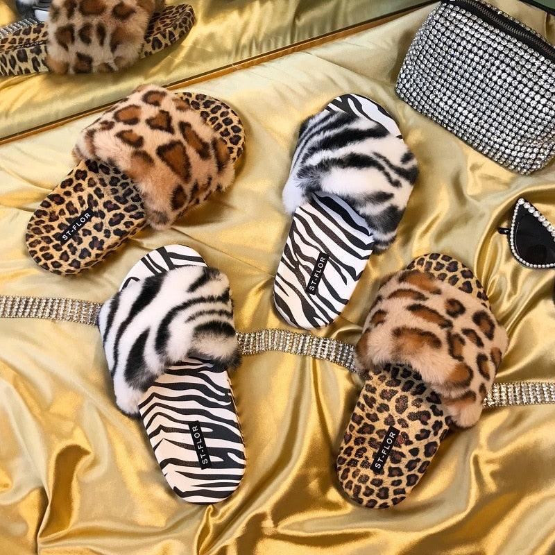 Women's black and white leopard print fuzzy faux fur slide slippers with open toe design and memory foam.