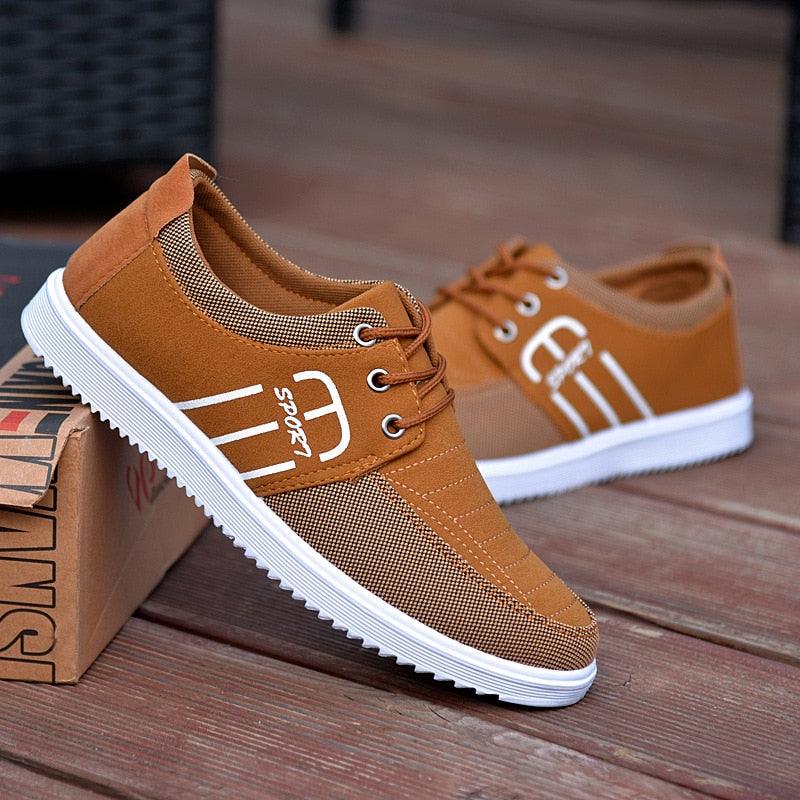 Modern men's sport-style canvas sneakers in brown and black