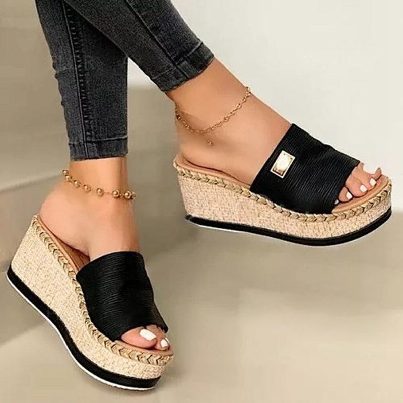 Women's elegant platform high-heeled sandals with ankle strap and open-toe design for summer.