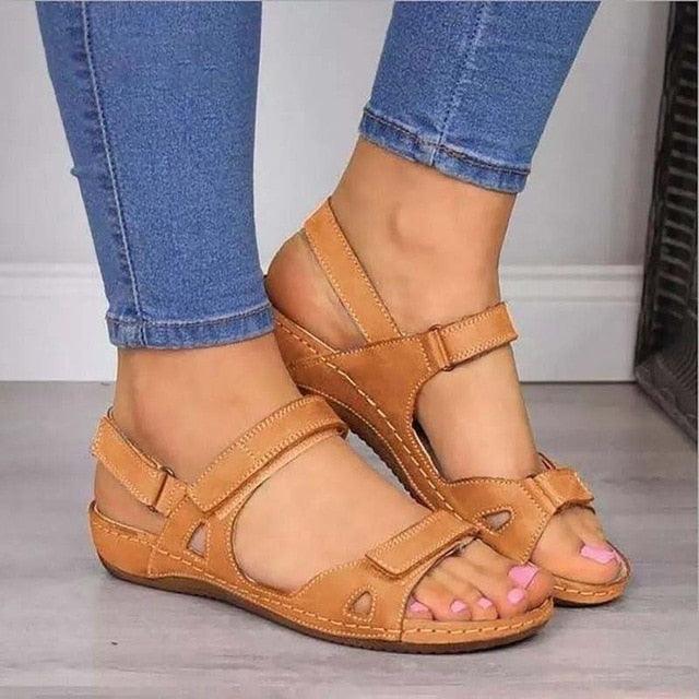 Women's blue leather sporty flat sandals with hook-and-loop closure and arch support