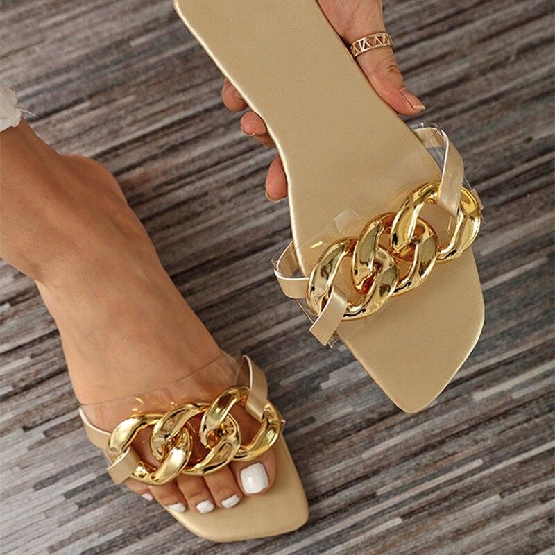 Stevvex women's square toe flat sandals with a decorative metal chain detail on the strap