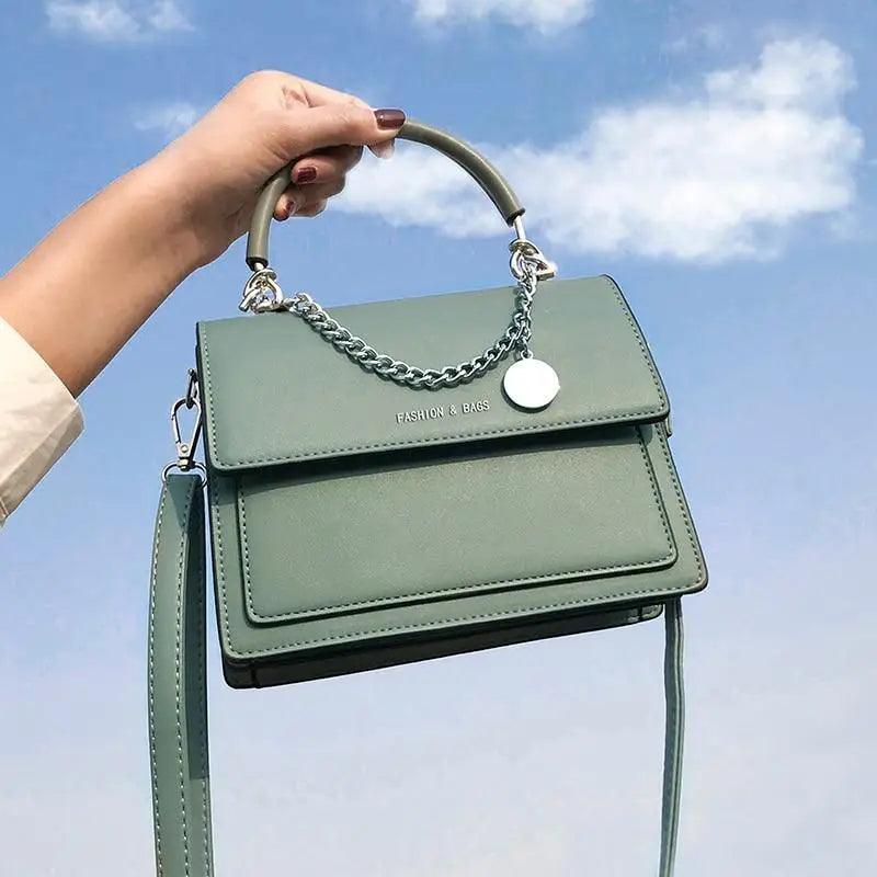 Modern square PU leather shoulder bag in solid color with metal hardware