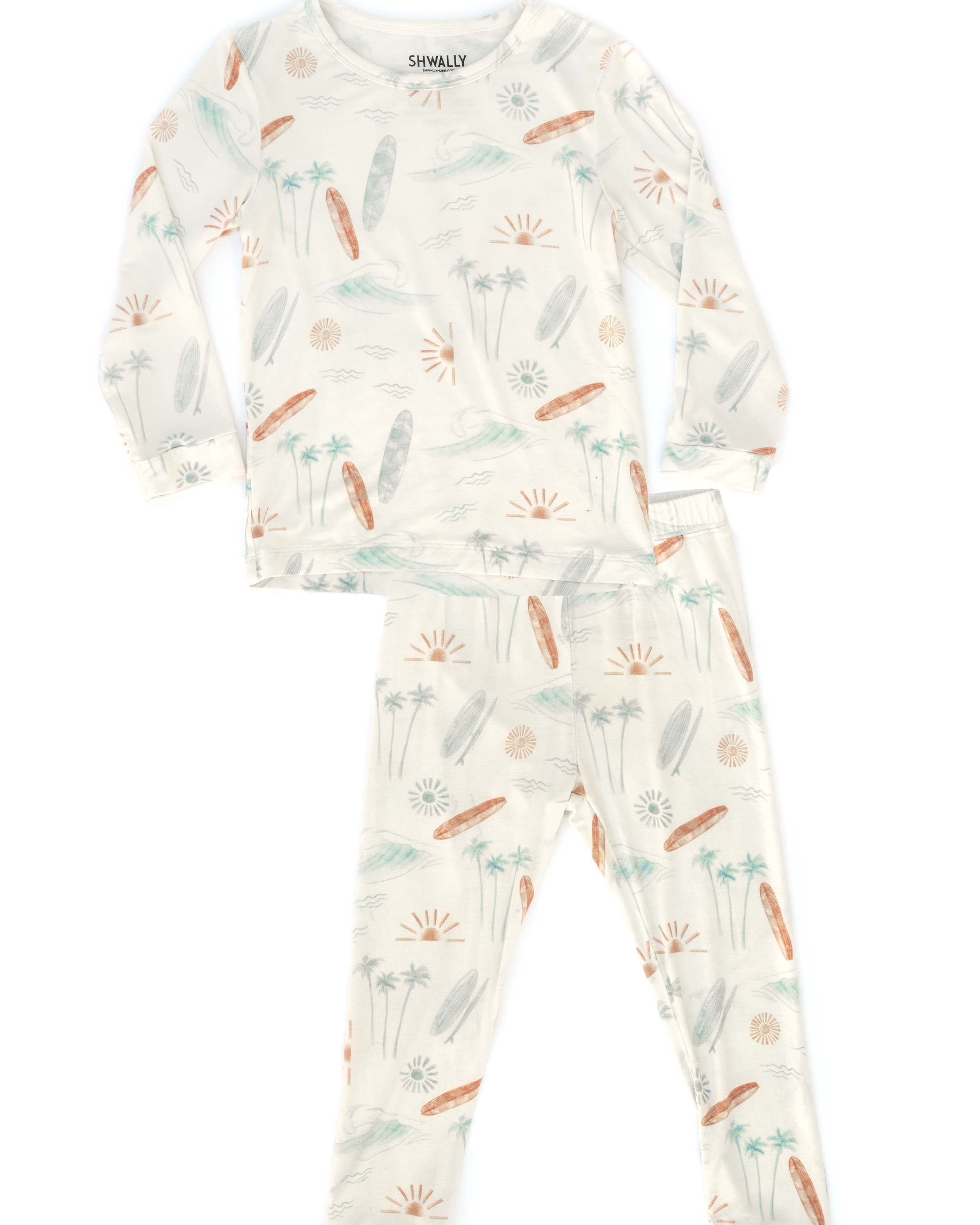 Children's pajama set with a nature-themed print on a white background