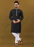 Front view of a black Matka silk designer kurta for men with silver jari embroidery and collar neck detail
