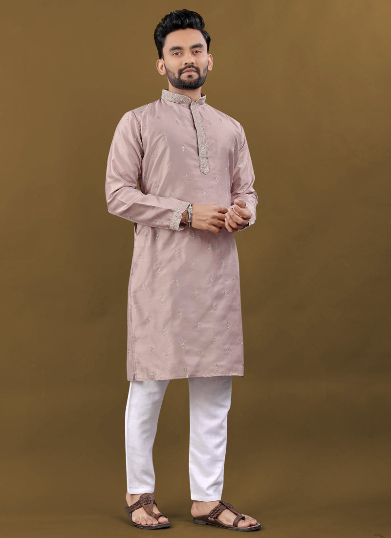 Blush pink men's designer silk kurta featuring all-over silver jari and embroidery buti detail