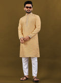 Men's yellow Matka silk kurta with silver Jari embroidery buti details