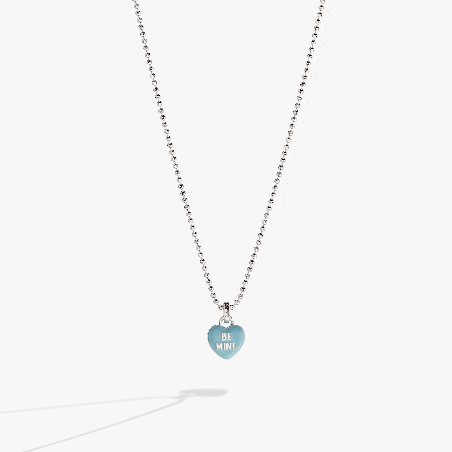 Sweethearts brand blue and silver-tone heart pendant necklace with BE MINE text